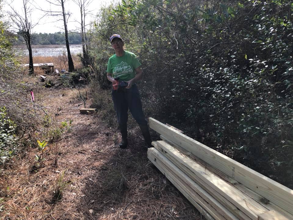 Donna checking out our treated lumber supply